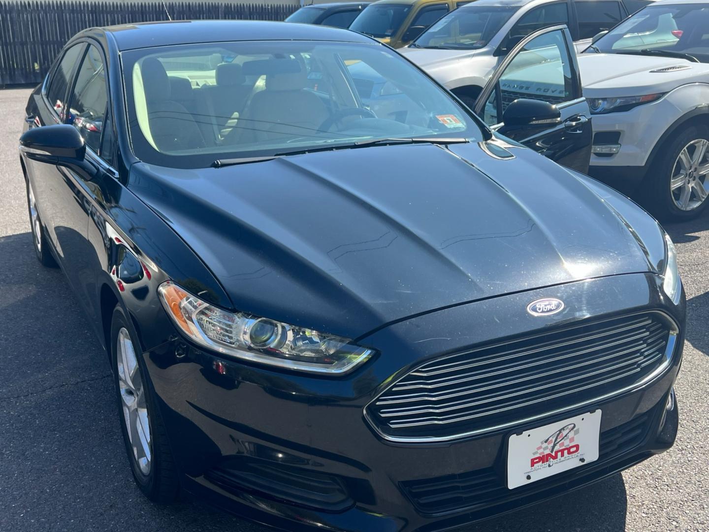 2016 BLACK /Beige Ford Fusion (3FA6P0H78GR) , located at 1018 Brunswick Ave, Trenton, NJ, 08638, (609) 989-0900, 40.240086, -74.748085 - Photo#12